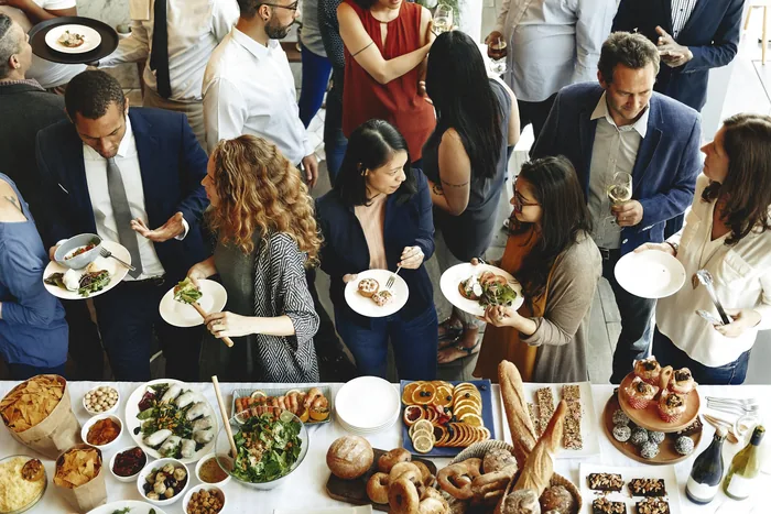 Guests being served at a Cream City Catering event